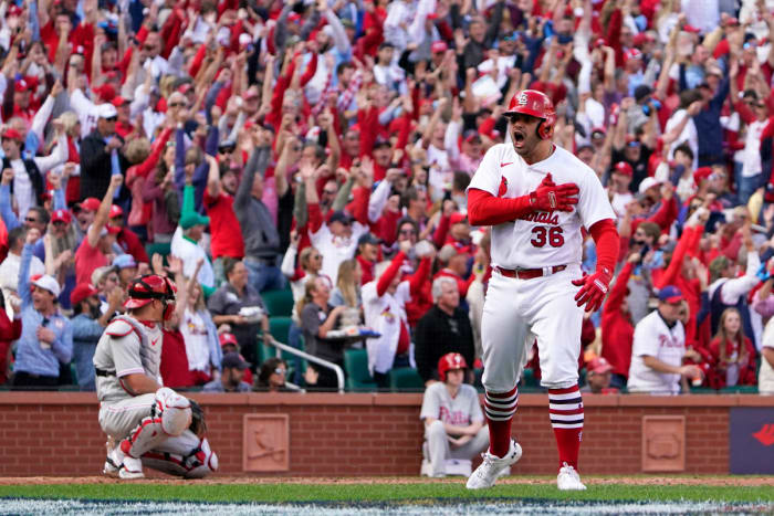 Cardinals rookie Juan Yepez reacts after crushing a go-ahead pinch-hit home run in his career first postseason at bat.